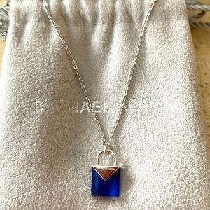 Sterling Silver necklace with blue crystal lock piece